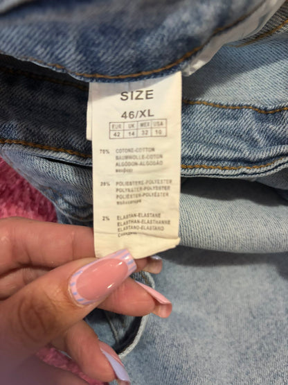 Fabric label showing 70% cotton, 28% polyester and 2% elastane